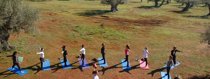 yoga class out in ature at eumelia